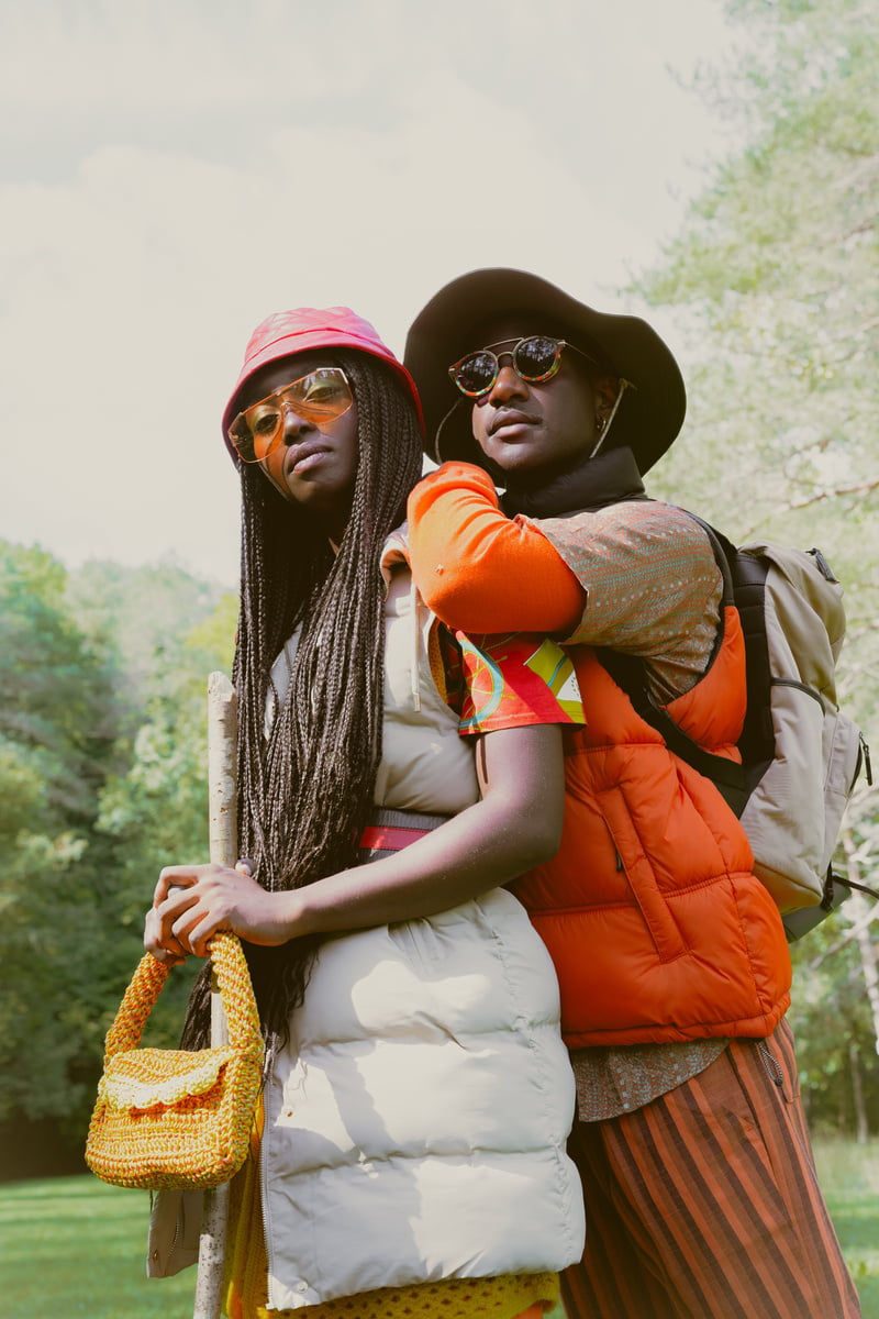 Man and Woman Hiking in the Forest